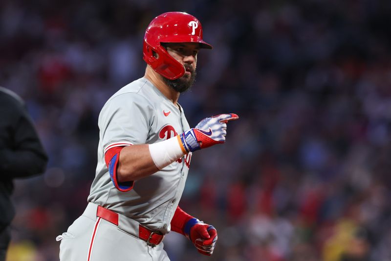 Jun 11, 2024; Boston, Massachusetts, USA; Philadelphia Phillies designated hitter Kyle Schwarber (12) celebrates after hitting a solo home run during the fifth inning against the Boston Red Sox at Fenway Park. Mandatory Credit: Paul Rutherford-USA TODAY Sports