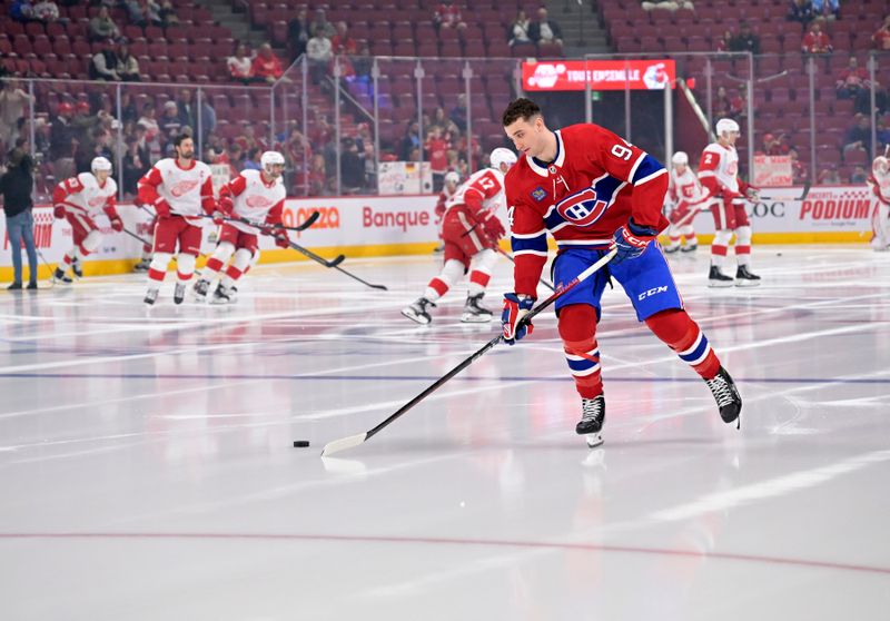 Apr 16, 2024; Montreal, Quebec, CAN; Montreal Canadiens defenseman Logan Mailloux (94) skates on his solo lap during the warmup period before the game against the Detroit Red Wings at the Bell Centre. Mandatory Credit: Eric Bolte-USA TODAY Sports