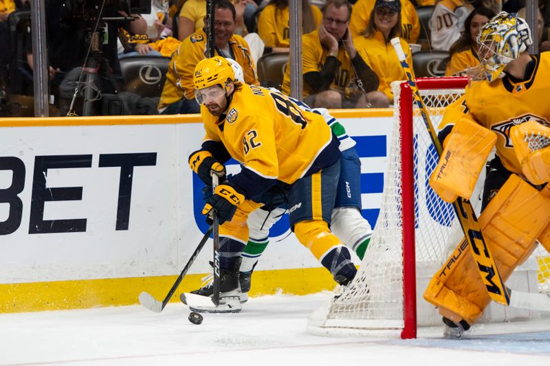 Apr 28, 2024; Nashville, Tennessee, USA; Nashville Predators center Tommy Novak (82) skates against the Vancouver Canuck during the third period in game four of the first round of the 2024 Stanley Cup Playoffs at Bridgestone Arena. Mandatory Credit: Steve Roberts-USA TODAY Sports