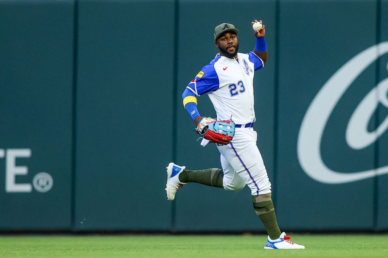 May 20, 2023; Atlanta, Georgia, USA; Atlanta Braves center fielder Michael Harris II (23) reacts after a catch against the Seattle Mariners in the second inning at Truist Park. Mandatory Credit: Brett Davis-USA TODAY Sports
