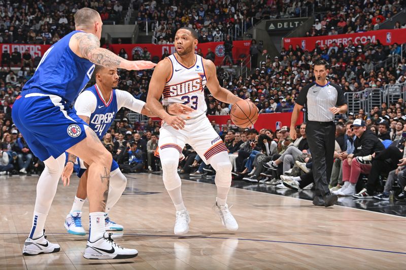 LOS ANGELES, CA - JANUARY 8: Eric Gordon #23 of the Phoenix Suns dribbles the ball during the game against the LA Clippers on January 8, 2024 at Crypto.Com Arena in Los Angeles, California. NOTE TO USER: User expressly acknowledges and agrees that, by downloading and/or using this Photograph, user is consenting to the terms and conditions of the Getty Images License Agreement. Mandatory Copyright Notice: Copyright 2024 NBAE (Photo by Andrew D. Bernstein/NBAE via Getty Images)