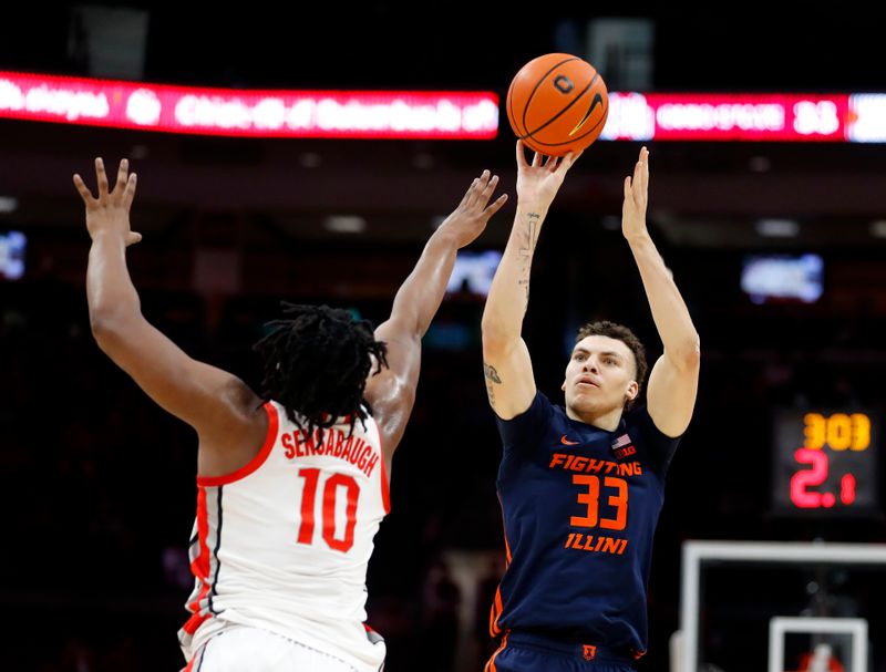 Feb 26, 2023; Columbus, Ohio, USA;  IIllinois Fighting Illini forward Coleman Hawkins (33) takes the three point shot as Ohio State Buckeyes forward Brice Sensabaugh (10) defends during the first half at Value City Arena. Mandatory Credit: Joseph Maiorana-USA TODAY Sports