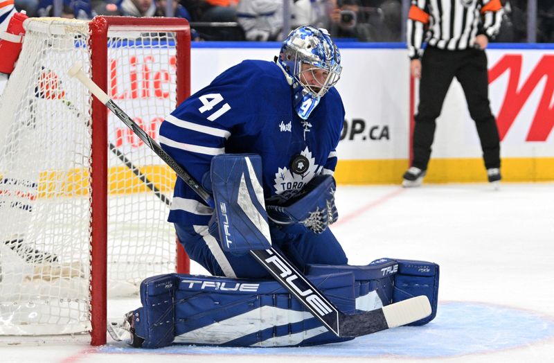 Nov 16, 2024; Toronto, Ontario, CAN;  Toronto Maple Leafs goalie Anthony Stolarz (41) makes a save against the Edmonton Oilers in the first period at Scotiabank Arena. Mandatory Credit: Dan Hamilton-Imagn Images