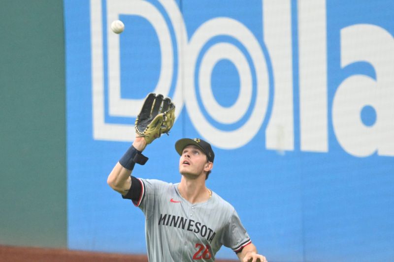 May 17, 2024; Cleveland, Ohio, USA; Minnesota Twins right fielder Max Kepler (26) makes a catch in the second inning against the Cleveland Guardians at Progressive Field. Mandatory Credit: David Richard-USA TODAY Sports