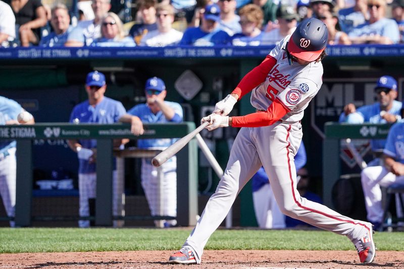 May 27, 2023; Kansas City, Missouri, USA; Washington Nationals shortstop CJ Abrams (5) hits an RBI double against the Kansas City Royals in the sixth inning at Kauffman Stadium. Mandatory Credit: Denny Medley-USA TODAY Sports