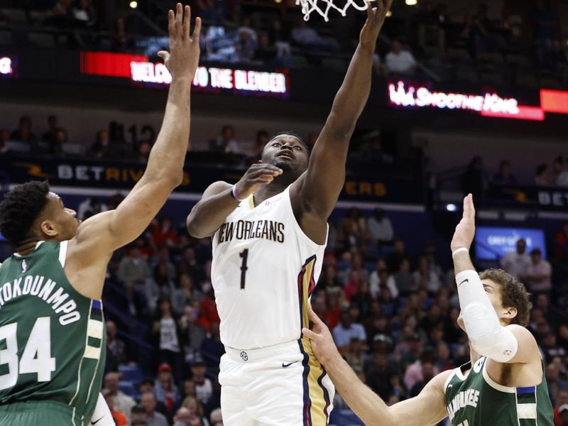 NEW ORLEANS, LOUISIANA - MARCH 28: Zion Williamson #1 of the New Orleans Pelicans shoots the ball over Giannis Antetokounmpo #34 of the Milwaukee Bucks at Smoothie King Center on March 28, 2024 in New Orleans, Louisiana. NOTE TO USER: User expressly acknowledges and agrees that, by downloading and or using this photograph, User is consenting to the terms and conditions of the Getty Images License Agreement.  (Photo by Chris Graythen/Getty Images)