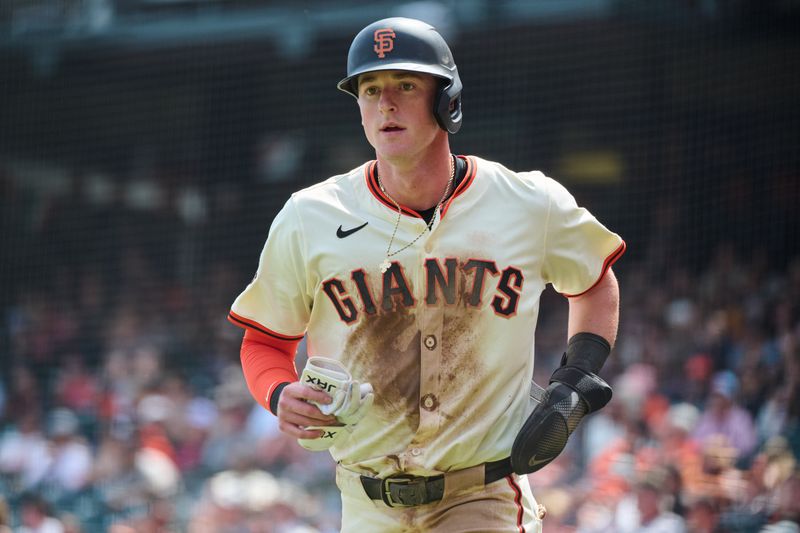 Apr 10, 2024; San Francisco, California, USA; San Francisco Giants shortstop Tyler Fitzgerald (49) returns to the dugout after scoring a run against the Washington Nationals during the fifth inning at Oracle Park. Mandatory Credit: Robert Edwards-USA TODAY Sports