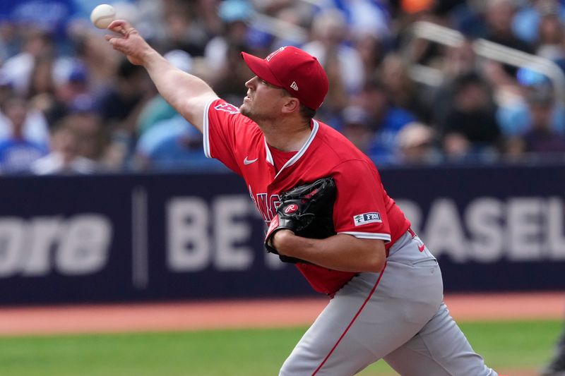 Aug 24, 2024; Toronto, Ontario, CAN; Los Angeles Angels starting pitcher Carson Fulmer (41) pitches to the Toronto Blue Jays during the  third inning at Rogers Centre. Mandatory Credit: John E. Sokolowski-USA TODAY Sports