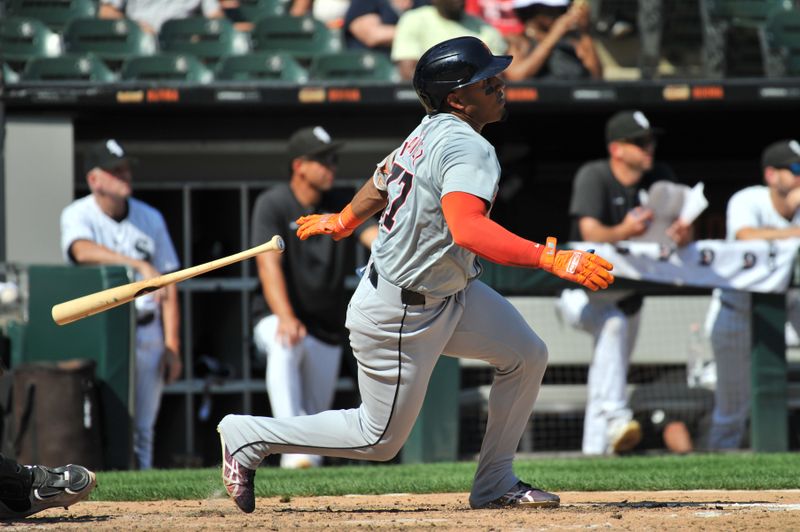 Aug 25, 2024; Chicago, Illinois, USA; Detroit Tigers second base Andy Ibanez (77) hits a two-run home run during the seventh inning against the Chicago White Sox at Guaranteed Rate Field. Mandatory Credit: Patrick Gorski-USA TODAY Sports