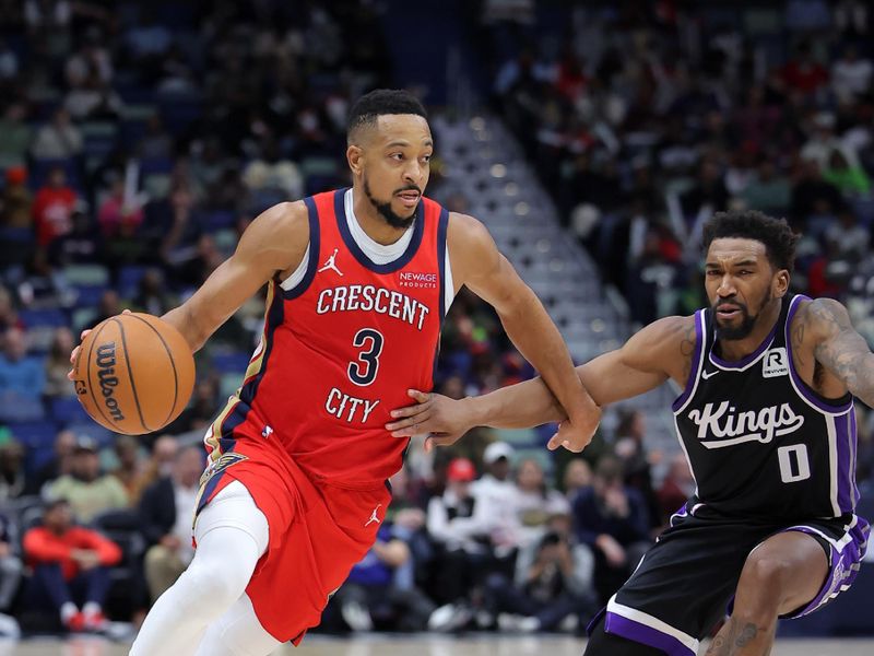 NEW ORLEANS, LOUISIANA - DECEMBER 12: CJ McCollum #3 of the New Orleans Pelicans drives against Malik Monk #0 of the Sacramento Kings during the second half at the Smoothie King Center on December 12, 2024 in New Orleans, Louisiana. NOTE TO USER: User expressly acknowledges and agrees that, by downloading and or using this Photograph, user is consenting to the terms and conditions of the Getty Images License Agreement. (Photo by Jonathan Bachman/Getty Images)