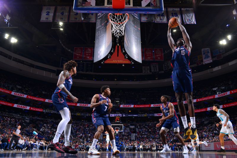 PHILADELPHIA, PA - MARCH 16: Mo Bamba #5 of the Philadelphia 76ers rebounds the ball during the game against the Charlotte Hornets on March 16, 2024 at the Wells Fargo Center in Philadelphia, Pennsylvania NOTE TO USER: User expressly acknowledges and agrees that, by downloading and/or using this Photograph, user is consenting to the terms and conditions of the Getty Images License Agreement. Mandatory Copyright Notice: Copyright 2024 NBAE (Photo by Jesse D. Garrabrant/NBAE via Getty Images)