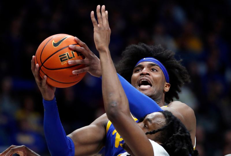 Feb 17, 2024; Pittsburgh, Pennsylvania, USA;  Pittsburgh Panthers forward Blake Hinson (2) shoots against the Louisville Cardinals during the first half at the Petersen Events Center. Pittsburgh won 86-59. Mandatory Credit: Charles LeClaire-USA TODAY Sports