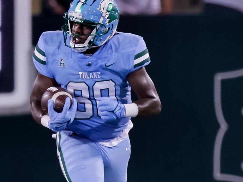 Oct 7, 2021; New Orleans, Louisiana, USA;  Tulane Green Wave tight end Tyrick James (80) catches a pass for 34 yards against Houston Cougars during the first half at Yulman Stadium. Mandatory Credit: Stephen Lew-USA TODAY Sports