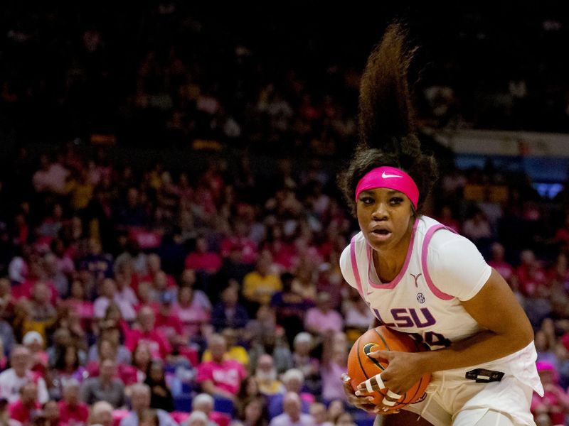 Feb 11, 2024; Baton Rouge, Louisiana, USA;  LSU Lady Tigers guard Aneesah Morrow (24) grabs a rebound against the Alabama Crimson Tide during the second half at Pete Maravich Assembly Center. Mandatory Credit: Matthew Hinton-USA TODAY Sports