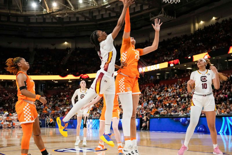 Mar 9, 2024; Greensville, SC, USA; South Carolina Gamecocks guard MiLaysia Fulwiley (12) shoots while defended by Tennessee Lady Vols center Tamari Key (20) during the second half at Bon Secours Wellness Arena. Mandatory Credit: Jim Dedmon-USA TODAY Sports