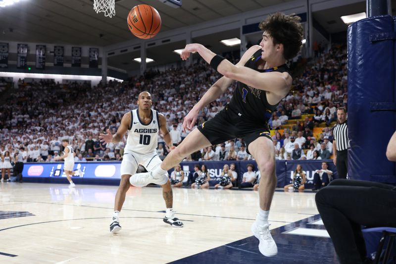 Jan 30, 2024; Logan, Utah, USA; San Jose State Spartans guard Garrett Anderson (1) saves the ball from going out of  bounds during the first half in the game against the Utah State Aggies at Dee Glen Smith Spectrum. Mandatory Credit: Rob Gray-USA TODAY Sports