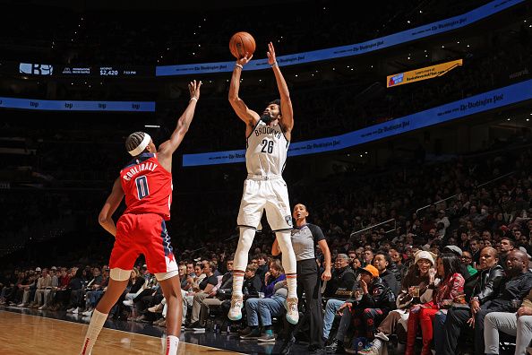 WASHINGTON, DC -? DECEMBER 29: Spencer Dinwiddie #26 of the Brooklyn Nets shoots the ball during the game against the Washington Wizards on December 29, 2023 at Capital One Arena in Washington, DC. NOTE TO USER: User expressly acknowledges and agrees that, by downloading and or using this Photograph, user is consenting to the terms and conditions of the Getty Images License Agreement. Mandatory Copyright Notice: Copyright 2023 NBAE (Photo by Stephen Gosling/NBAE via Getty Images)