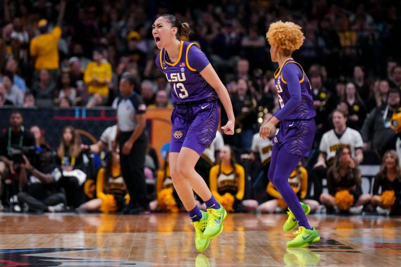 Apr 2, 2023; Dallas, TX, USA; LSU Lady Tigers guard Last-Tear Poa (13) yells as she reacts on the court in the game against the Iowa Hawkeyes in the first half during the final round of the Women's Final Four NCAA tournament at the American Airlines Center. Mandatory Credit: Kirby Lee-USA TODAY Sports
