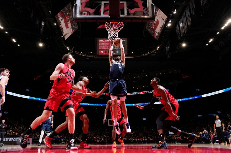 TORONTO, CANADA - FEBRUARY 28: Dereck Lively II #2 of the Dallas Mavericks drives to the basket during the game against the Toronto Raptors on February 28, 2024 at the Scotiabank Arena in Toronto, Ontario, Canada.  NOTE TO USER: User expressly acknowledges and agrees that, by downloading and or using this Photograph, user is consenting to the terms and conditions of the Getty Images License Agreement.  Mandatory Copyright Notice: Copyright 2024 NBAE (Photo by Mark Blinch/NBAE via Getty Images)