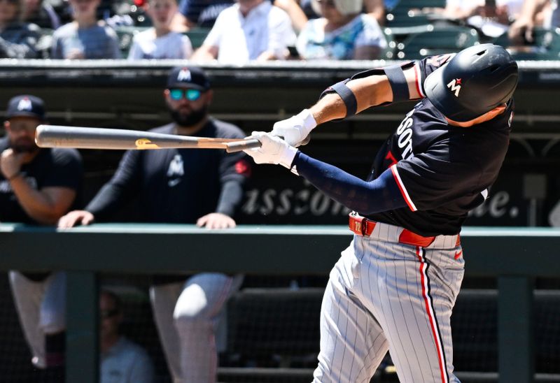 Jul 10, 2024; Chicago, Illinois, USA;  Minnesota Twins third base Brooks Lee (72) breaks his bat during the first inning against the Chicago White Sox at Guaranteed Rate Field. Mandatory Credit: Matt Marton-USA TODAY Sports