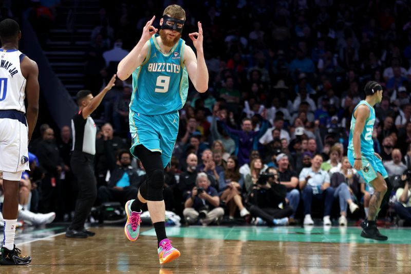 CHARLOTTE, NORTH CAROLINA - APRIL 09: Davis Bertans #9 of the Charlotte Hornets reacts after making a three pointer during the second half of an NBA game against the Dallas Mavericks at Spectrum Center on April 09, 2024 in Charlotte, North Carolina. NOTE TO USER: User expressly acknowledges and agrees that, by downloading and or using this photograph, User is consenting to the terms and conditions of the Getty Images License Agreement. (Photo by David Jensen/Getty Images)