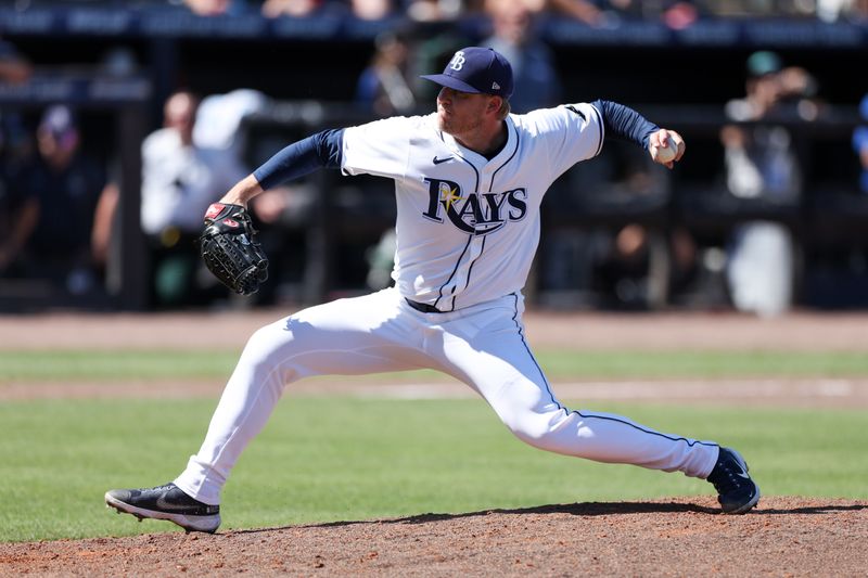 Apr 13, 2025; Tampa, Florida, USA; Tampa Bay Rays pitcher Garrett Cleavinger (60) throws a pitch against the Atlanta Braves in the seventh inning at George M. Steinbrenner Field. Mandatory Credit: Nathan Ray Seebeck-Imagn Images