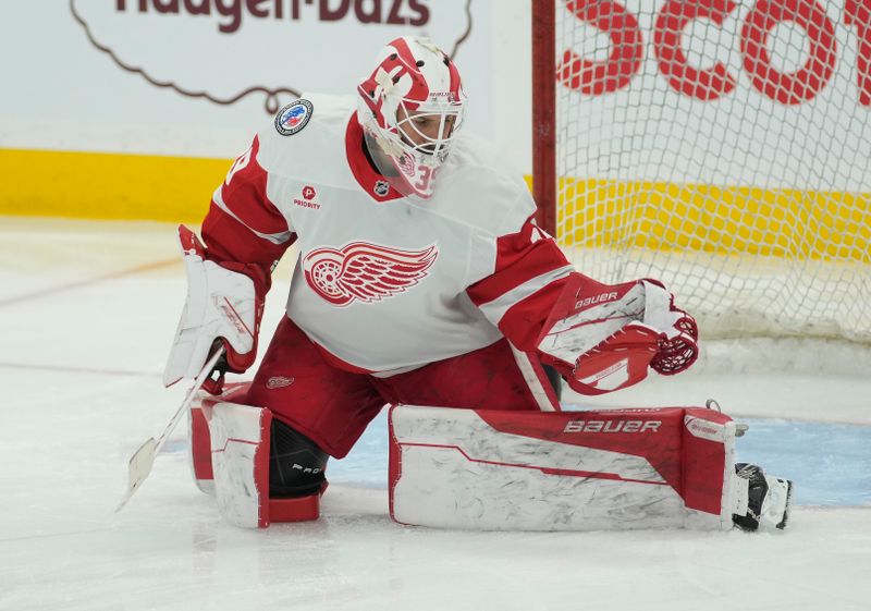 Nov 8, 2024; Toronto, Ontario, CAN; Detroit Red Wings goaltender Cam Talbot (39) makes a save during warm up before a game against the Toronto Maple Leafs at Scotiabank Arena. Mandatory Credit: John E. Sokolowski-Imagn Images