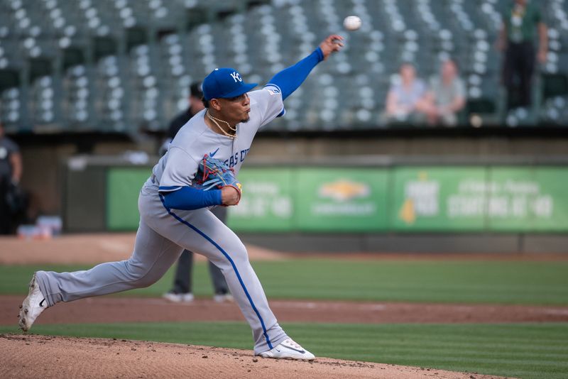 Aug 22, 2023; Oakland, California, USA; Kansas City Royals relief pitcher Angel Zerpa (61) throws a pitch during the first inning against the Oakland Athletics at Oakland-Alameda County Coliseum. Mandatory Credit: Ed Szczepanski-USA TODAY Sports