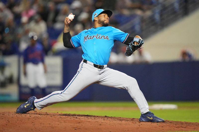 Mar 3, 2025; Port St. Lucie, Florida, USA;  Miami Marlins pitches Xzavion Curry (49) pitches in the fifth inning against the New York Mets at Clover Park. Mandatory Credit: Jim Rassol-Imagn Images