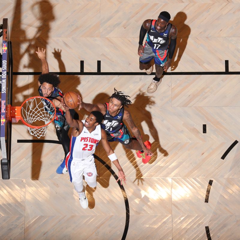 BROOKLYN, NY - APRIL 6: Noah Clowney #21 of the Brooklyn Nets  blocks a shot during the game against the Detroit Pistons on April 6, 2024 at Barclays Center in Brooklyn, New York. NOTE TO USER: User expressly acknowledges and agrees that, by downloading and or using this Photograph, user is consenting to the terms and conditions of the Getty Images License Agreement. Mandatory Copyright Notice: Copyright 2024 NBAE (Photo by Nathaniel S. Butler/NBAE via Getty Images)