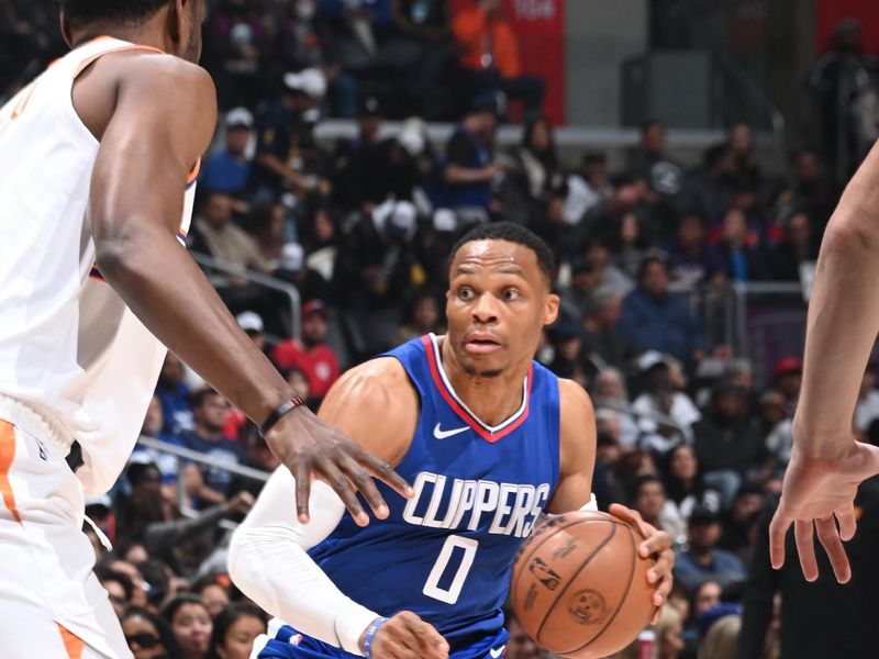 LOS ANGELES, CA - JANUARY 8: Russell Westbrook #0 of the LA Clippers dribbles the ball during the game against the Phoenix Suns on January 8, 2024 at Crypto.Com Arena in Los Angeles, California. NOTE TO USER: User expressly acknowledges and agrees that, by downloading and/or using this Photograph, user is consenting to the terms and conditions of the Getty Images License Agreement. Mandatory Copyright Notice: Copyright 2024 NBAE (Photo by Andrew D. Bernstein/NBAE via Getty Images)