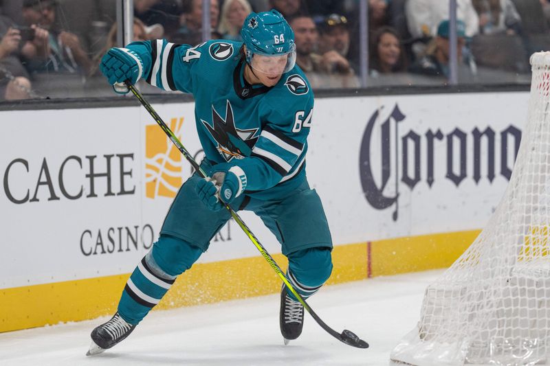 Nov 14, 2023; San Jose, California, USA; San Jose Sharks center Mikael Granlund (64) controls the puck during the second period against the Florida Panthers at SAP Center at San Jose. Mandatory Credit: Stan Szeto-USA TODAY Sports