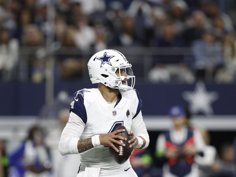 Dallas Cowboys quarterback Dak Prescott (4) looks to pass during an NFL football game against the Philadelphia Eagles, Sunday, Dec. 10, 2023, in Arlington, Texas. (AP Photo/Matt Patterson)