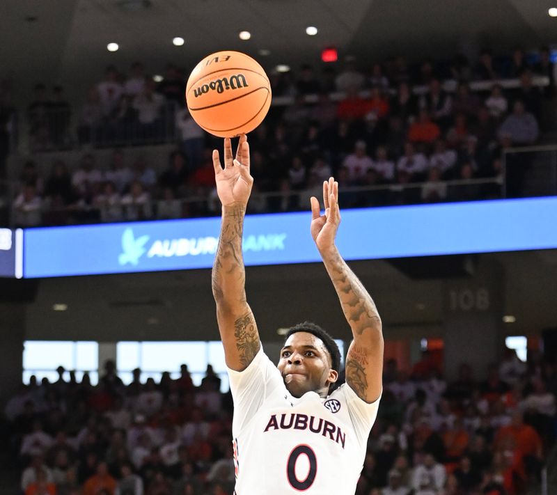 Feb 11, 2023; Auburn, Alabama, USA;  Auburn Tigers guard K.D. Johnson (0) shoots against the Alabama Crimson Tide at Neville Arena. Mandatory Credit: Julie Bennett-USA TODAY Sports
