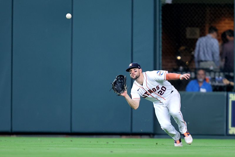 Aug 24, 2023; Houston, Texas, USA; Houston Astros center fielder Chas McCormick (20) catches a fly ball for an out against the Boston Red Sox during the sixth inning at Minute Maid Park. Mandatory Credit: Erik Williams-USA TODAY Sports
