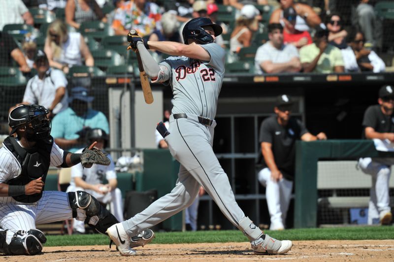 Aug 25, 2024; Chicago, Illinois, USA; Detroit Tigers center fielder Parker Meadows (22) hits an RBI triple during the fourth inning against the Chicago White Sox at Guaranteed Rate Field. Mandatory Credit: Patrick Gorski-USA TODAY Sports