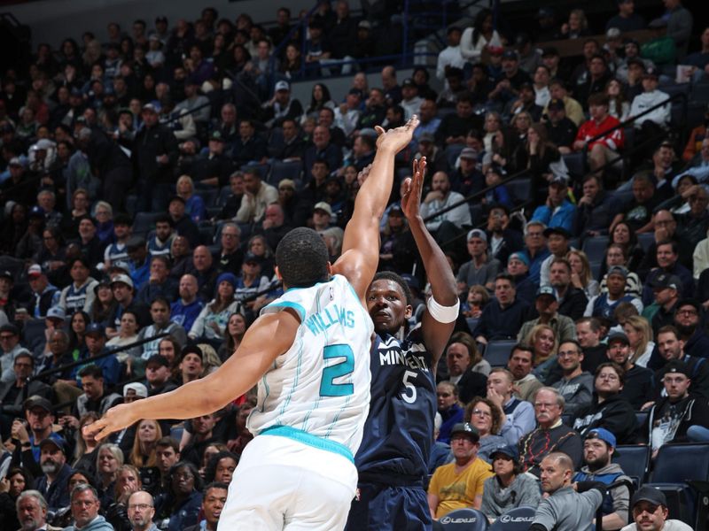 MINNEAPOLIS, MN -  NOVEMBER 4: Anthony Edwards #5 of the Minnesota Timberwolves shoots a three point basket during the game against the Charlotte Hornets on November 4, 2024 at Target Center in Minneapolis, Minnesota. NOTE TO USER: User expressly acknowledges and agrees that, by downloading and or using this Photograph, user is consenting to the terms and conditions of the Getty Images License Agreement. Mandatory Copyright Notice: Copyright 2024 NBAE (Photo by David Sherman/NBAE via Getty Images)