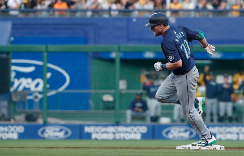 Aug 16, 2024; Pittsburgh, Pennsylvania, USA;  Seattle Mariners first baseman Luke Raley (20) runs after hitting a two run home run against the Pittsburgh Pirates during the fourth inning at PNC Park. Mandatory Credit: Charles LeClaire-USA TODAY Sports