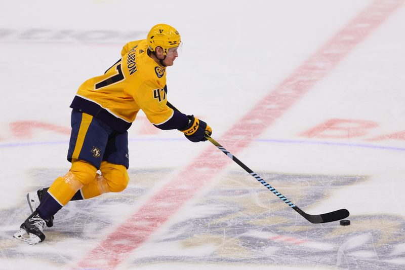 Mar 21, 2024; Sunrise, Florida, USA; Nashville Predators right wing Michael McCarron (47) moves the puck against the Florida Panthers during the third period at Amerant Bank Arena. Mandatory Credit: Sam Navarro-USA TODAY Sports