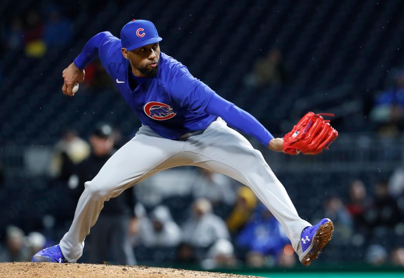 May 11, 2024; Pittsburgh, Pennsylvania, USA; Chicago Cubs relief pitcher Jose Cuas (74) throws against the Pittsburgh Pirates during the seventh inning at PNC Park. Mandatory Credit: Charles LeClaire-USA TODAY Sports