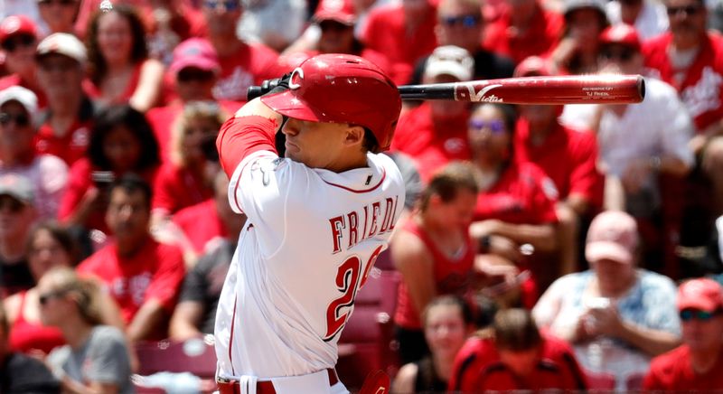 Jun 21, 2023; Cincinnati, Ohio, USA; Cincinnati Reds center fielder TJ Friedl (29) hits an RBI single against the Colorado Rockies during the fifth inning at Great American Ball Park. Mandatory Credit: David Kohl-USA TODAY Sports