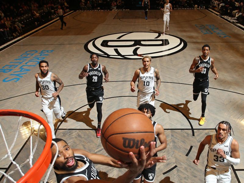 BROOKLYN, NY - FEBRUARY 10: Mikal Bridges #1 of the Brooklyn Nets drives to the basket during the game against the San Antonio Spurs on February 10, 2024 at Barclays Center in Brooklyn, New York. NOTE TO USER: User expressly acknowledges and agrees that, by downloading and or using this Photograph, user is consenting to the terms and conditions of the Getty Images License Agreement. Mandatory Copyright Notice: Copyright 2024 NBAE (Photo by Nathaniel S. Butler/NBAE via Getty Images)