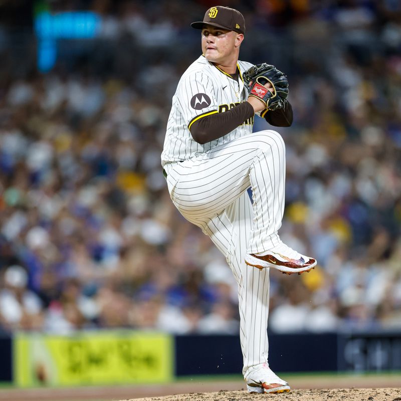 Jul 30, 2024; San Diego, California, USA; San Diego Padres relief pitcher Adrian Morejon (50) throws a pitch during the seventh inning against the Los Angeles Dodgers at Petco Park. Mandatory Credit: David Frerker-USA TODAY Sports