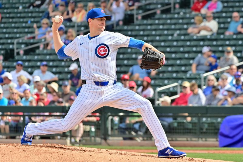 Feb 27, 2024; Mesa, Arizona, USA;  Chicago Cubs starting pitcher Kyle Hendricks (28) throws in the first inning against the Cincinnati Reds during a spring training game at Sloan Park. Mandatory Credit: Matt Kartozian-USA TODAY Sports