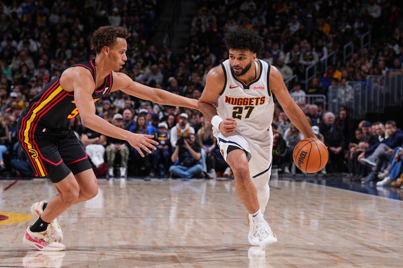 DENVER, CO - JANUARY 1:  Jamal Murray #27 of the Denver Nuggets dribbles the ball during the game against the Atlanta Hawks on January 1, 2025 at Ball Arena in Denver, Colorado. NOTE TO USER: User expressly acknowledges and agrees that, by downloading and/or using this Photograph, user is consenting to the terms and conditions of the Getty Images License Agreement. Mandatory Copyright Notice: Copyright 2025 NBAE (Photo by Garrett Ellwood/NBAE via Getty Images)