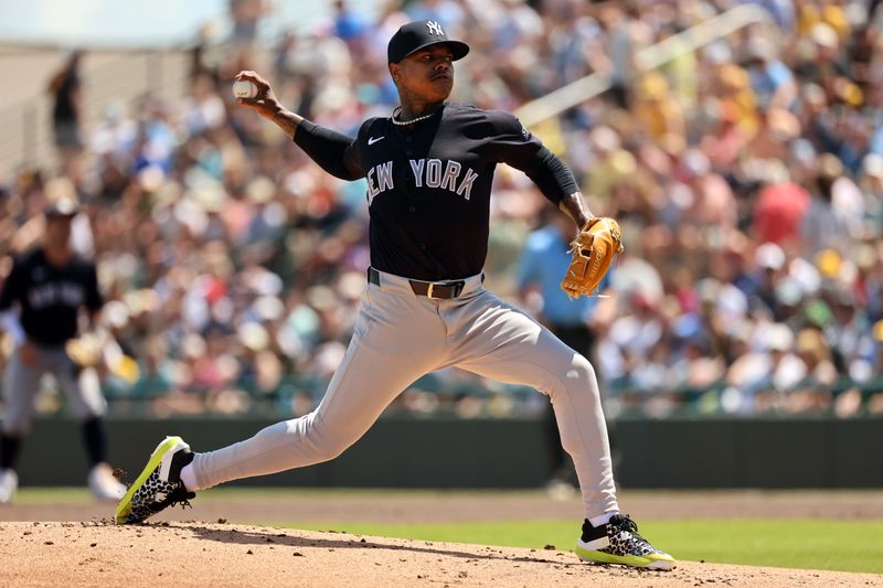 Mar 24, 2024; Bradenton, Florida, USA;  New York Yankees starting pitcher Marcus Stroman (0) throws a pitch during the first inning against the Pittsburgh Pirates at LECOM Park. Mandatory Credit: Kim Klement Neitzel-USA TODAY Sports