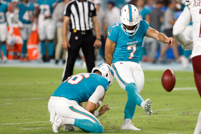 Miami Dolphins kicker Jason Sanders (7) kicks a field goal during the second half of a preseason NFL football game against the Washington Commanders, Saturday, Aug. 17, 2024, in Miami Gardens, Fla. (AP Photo/Rhona Wise)