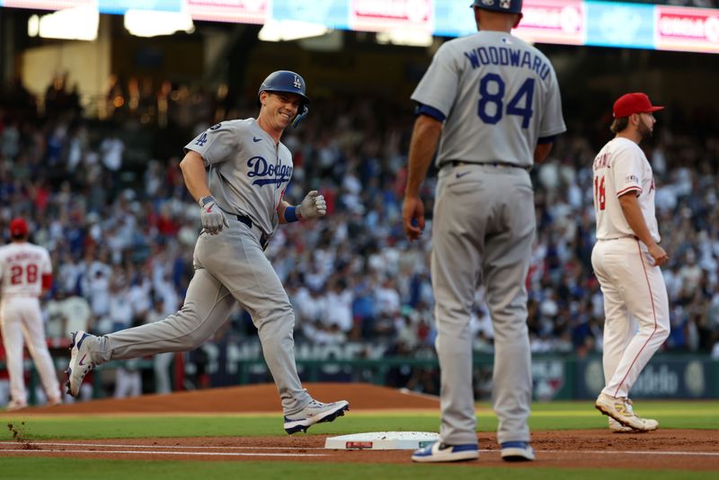 Aug 13, 2025; Anaheim, California, USA;  Los Angeles Dodgers catcher Will Smith (16) runs around bases after hitting a two-run home run during the first inning against the Los Angeles Angels at Angel Stadium. Mandatory Credit: Kiyoshi Mio-Imagn Images
