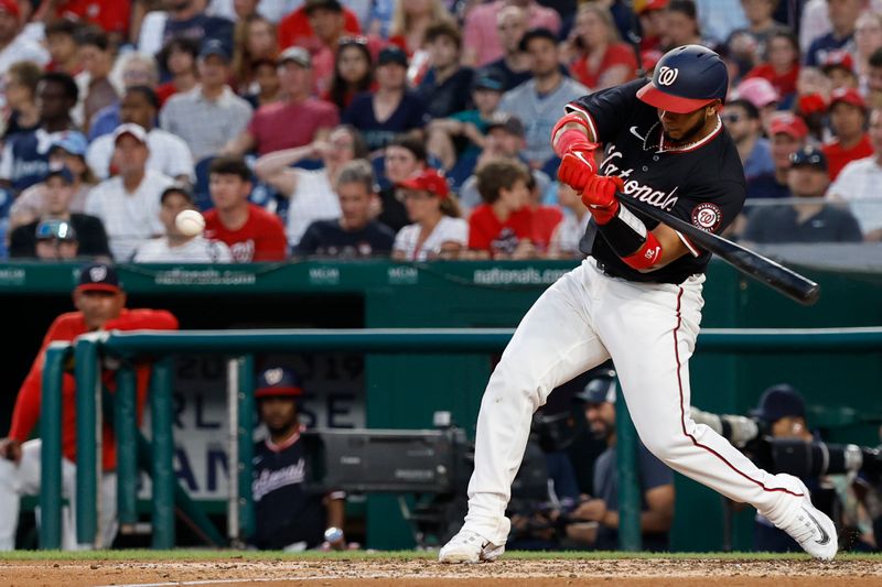 May 24, 2024; Washington, District of Columbia, USA; Washington Nationals catcher Keibert Ruiz (20) hits a two run home run against the Seattle Mariners during the sixth inning at Nationals Park. Mandatory Credit: Geoff Burke-USA TODAY Sports