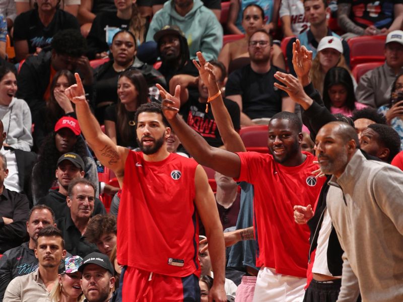 MIAMI, FL - MARCH 10: The Washington Wizards bench celebrates three point basket during the game against the Miami Heat on March 10, 2024 at Kaseya Center in Miami, Florida. NOTE TO USER: User expressly acknowledges and agrees that, by downloading and or using this Photograph, user is consenting to the terms and conditions of the Getty Images License Agreement. Mandatory Copyright Notice: Copyright 2024 NBAE (Photo by Issac Baldizon/NBAE via Getty Images)